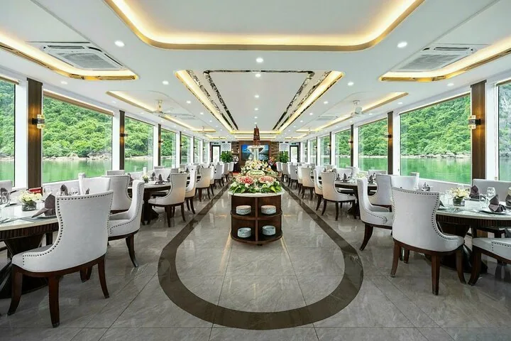 Spacious and modern dining hall on a cruise ship with large windows